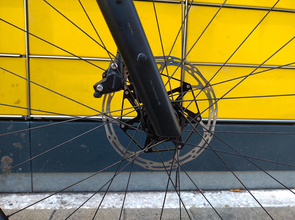 Rose Hobo Rival eTap AXS XPLR Gravelbike Weiß Bremsscheibe vorne rechts